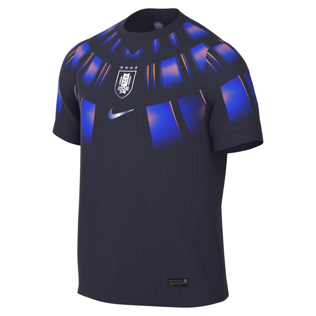 Deep navy · electric-blue wings · garra charrúa